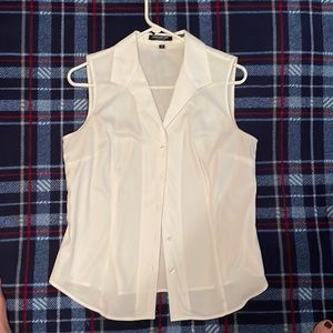 Cute White sleeveless tailored size Medium shirt.